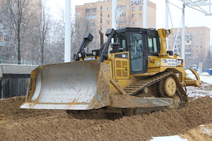 Земляные работы-компания Техоптимум.
Бульдозер CAT D6R XL компании Техоптимум.